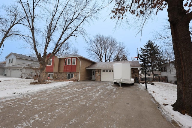 tri-level home featuring a garage