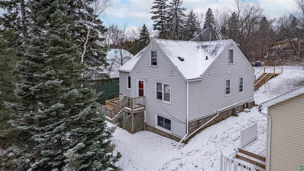 view of snow covered property