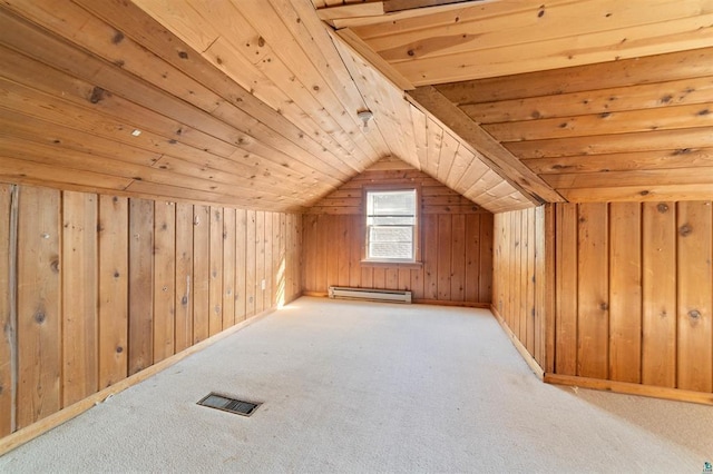 additional living space featuring baseboard heating, wooden walls, carpet flooring, vaulted ceiling, and wooden ceiling