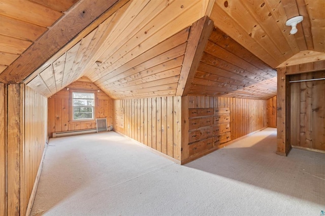 additional living space with wood walls, lofted ceiling, a baseboard heating unit, light carpet, and wooden ceiling