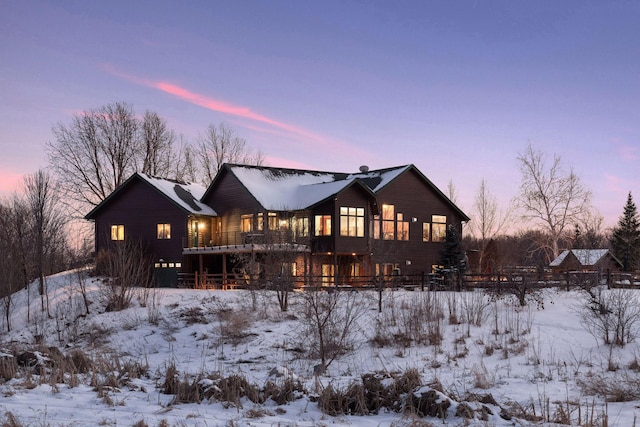 view of snow covered house