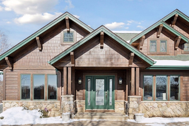 view of front of home with stone siding