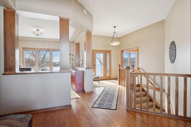 entrance foyer featuring baseboards and light wood-style floors