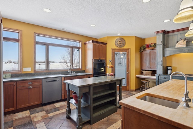 kitchen with oven, a sink, a center island, dishwasher, and open shelves