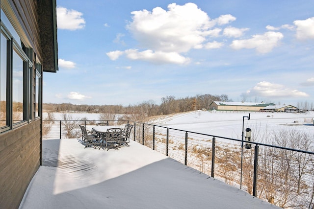 view of snow covered patio