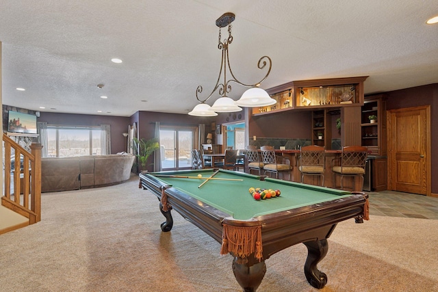 game room with indoor bar, recessed lighting, light colored carpet, a textured ceiling, and billiards