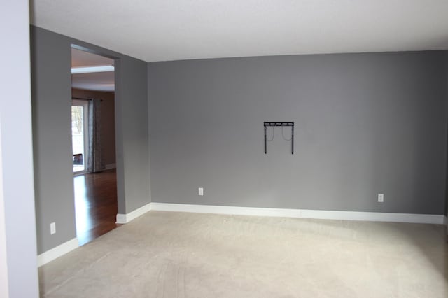 unfurnished room with carpet flooring