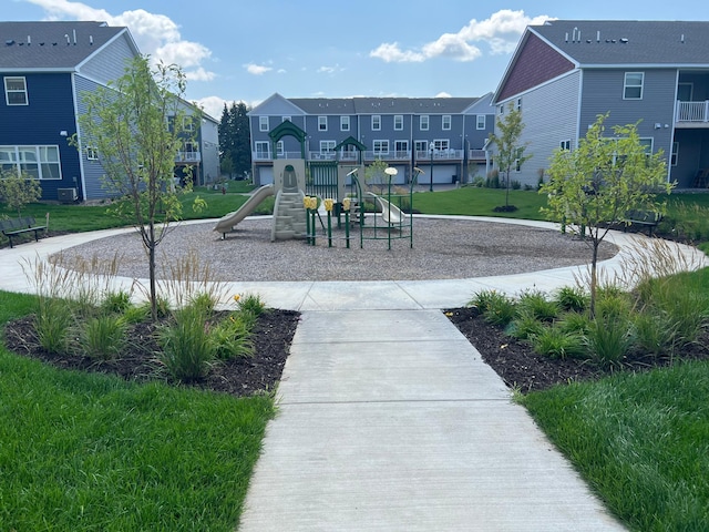 view of playground featuring a lawn