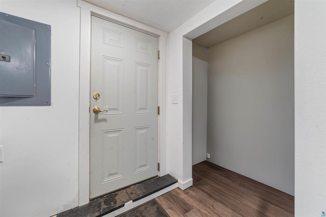 doorway to property featuring electric panel