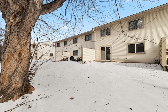 view of snow covered house