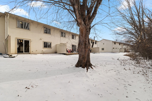 view of snow covered house