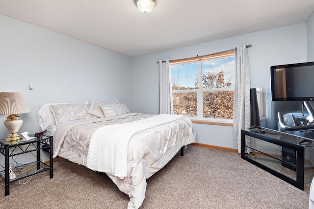 carpeted bedroom with a textured ceiling