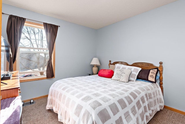 bedroom featuring carpet