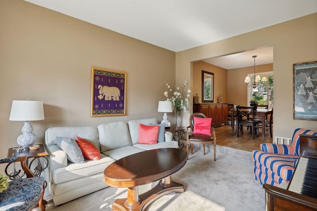 living room featuring an inviting chandelier