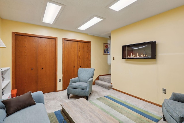 living room with light colored carpet