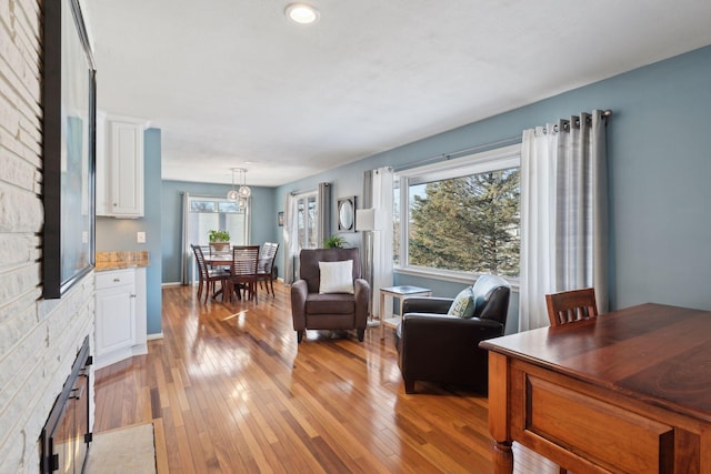 living room with a healthy amount of sunlight and light wood-type flooring