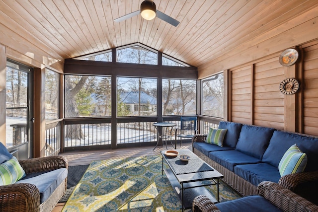 sunroom with ceiling fan, vaulted ceiling, and wooden ceiling