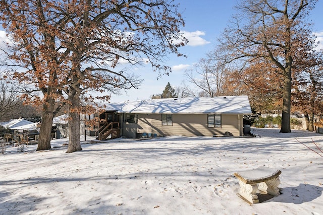 view of snow covered property