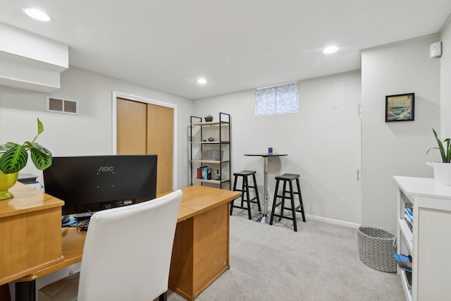 home office featuring light carpet, visible vents, recessed lighting, and baseboards