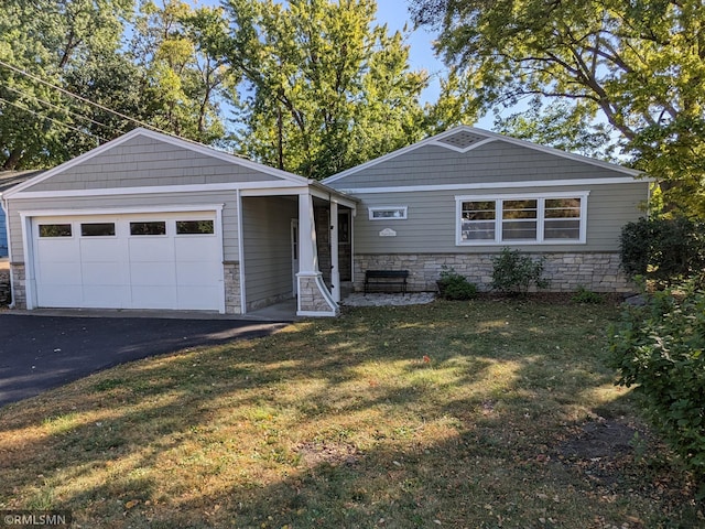 single story home with a garage, aphalt driveway, stone siding, and a front lawn