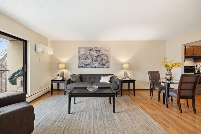 living room with a wall mounted air conditioner, light wood-type flooring, and a baseboard heating unit