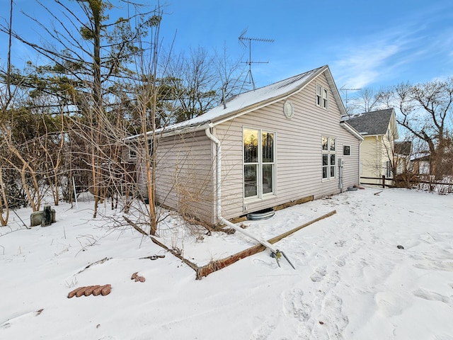 view of snow covered property