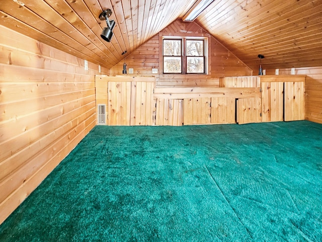 bonus room featuring lofted ceiling, carpet floors, wooden ceiling, and wood walls