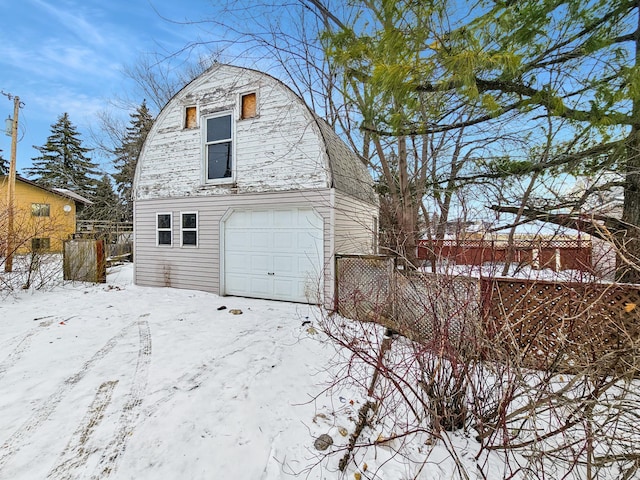 view of snow covered garage