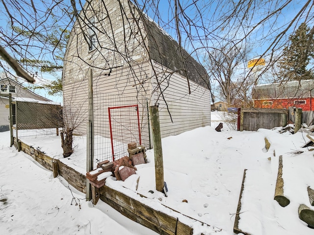 view of yard layered in snow