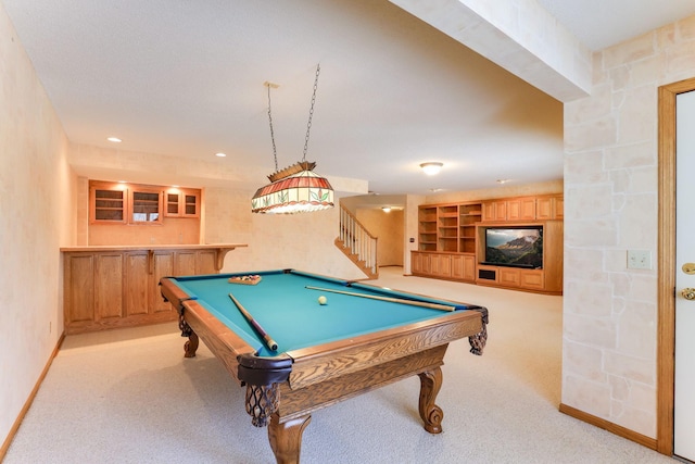 rec room featuring bar, billiards, light colored carpet, and built in features