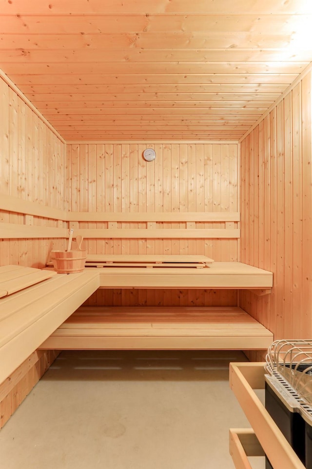 view of sauna featuring concrete flooring