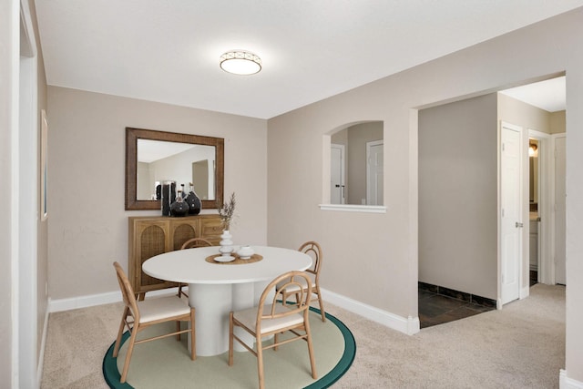 view of carpeted dining room