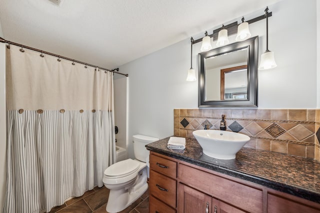 full bathroom featuring tile patterned flooring, toilet, vanity, tasteful backsplash, and shower / bathtub combination with curtain