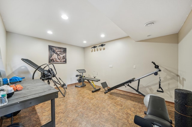 workout room featuring baseboards and recessed lighting