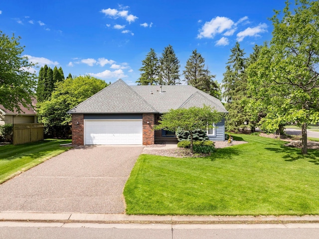 5639 Park Place Dr, Shoreview, MN 55126 - view of front facade with a front lawn, a garage, driveway, and brick siding