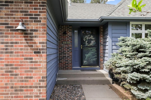 5639 Park Place Dr, Shoreview, MN 55126 - doorway to property with brick siding and a shingled roof
