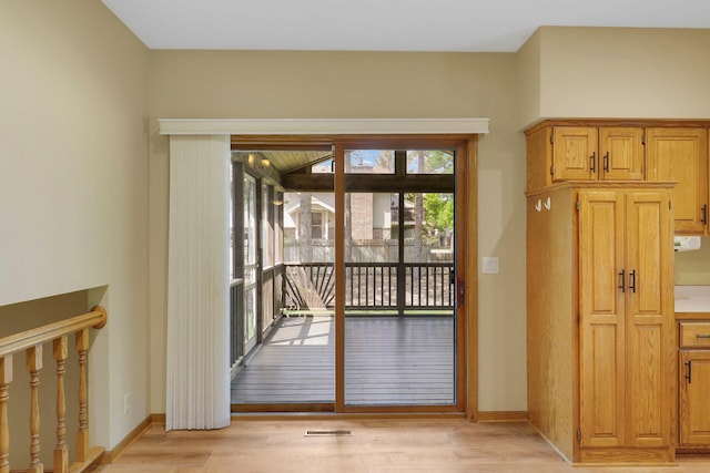 5639 Park Place Dr, Shoreview, MN 55126 - entryway with light wood-style floors and baseboards