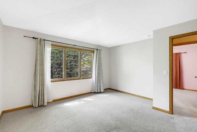 5639 Park Place Dr, Shoreview, MN 55126 - carpeted spare room featuring baseboards