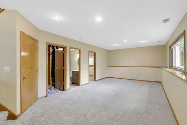 5639 Park Place Dr, Shoreview, MN 55126 - unfurnished room with light colored carpet, recessed lighting, and baseboards