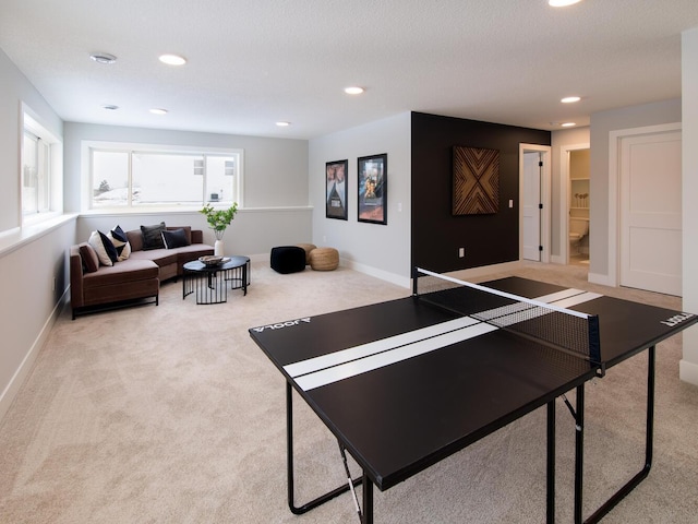 playroom with a healthy amount of sunlight and carpet