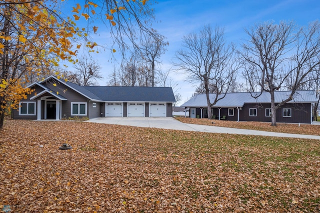 ranch-style home featuring a garage