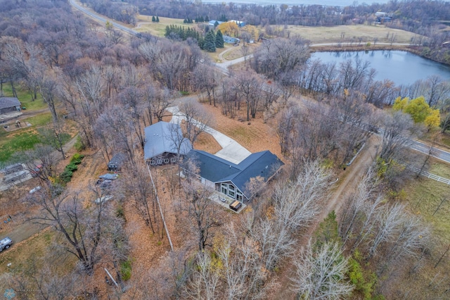 birds eye view of property with a rural view and a water view