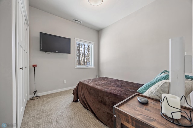 bedroom with light carpet