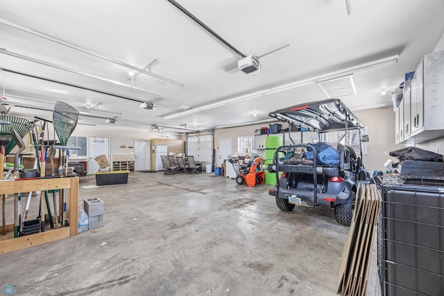 garage featuring a garage door opener