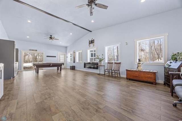 game room featuring wood-type flooring, vaulted ceiling, ceiling fan, and billiards