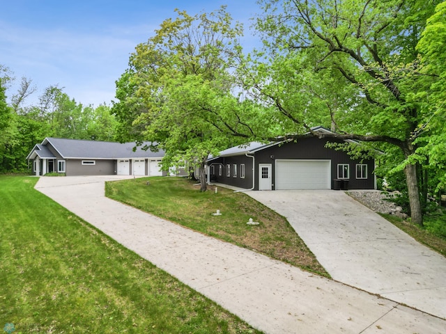 25379 Deerpath Loop, Pelican Rapids, MN 56572 - ranch-style house featuring driveway, a front yard, and an attached garage