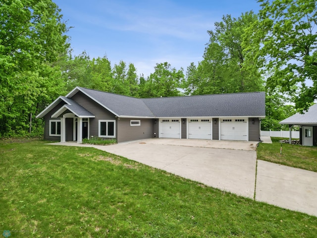 25379 Deerpath Loop, Pelican Rapids, MN 56572 - ranch-style house with a front yard, an attached garage, concrete driveway, and roof with shingles