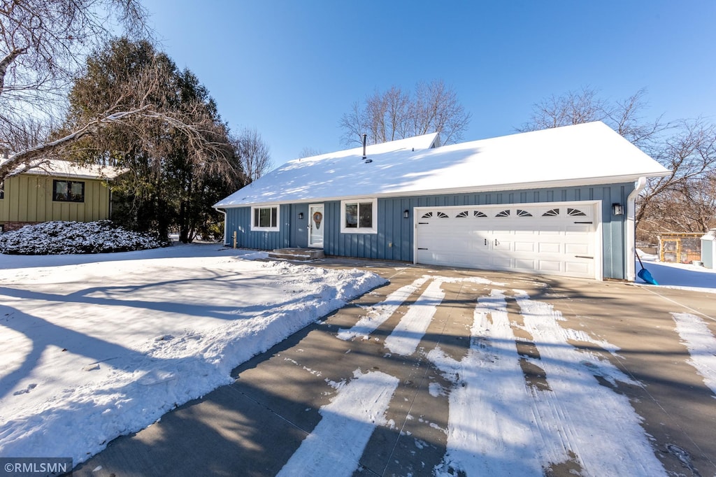 ranch-style house with a garage