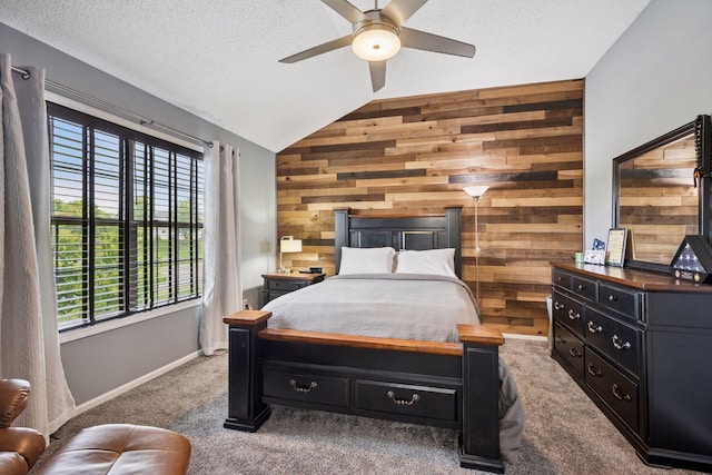 7316 Bunker Lake Blvd NW, Ramsey, MN 55303 - bedroom with lofted ceiling, wooden walls, carpet flooring, a textured ceiling, and a ceiling fan