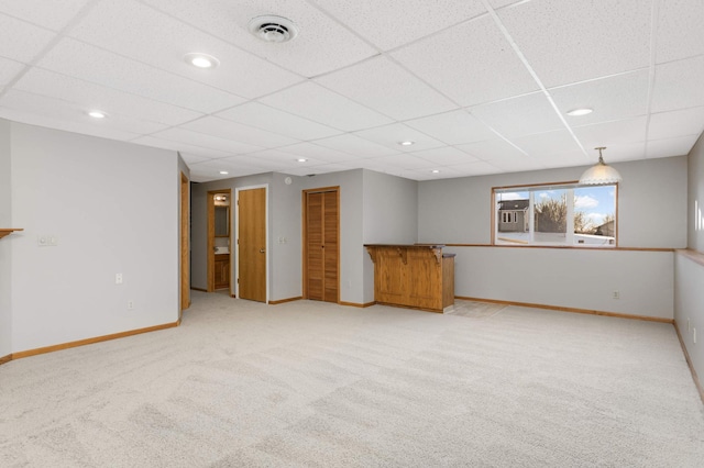 interior space featuring a paneled ceiling